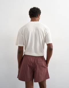 Model wearing Micro fit stripe short in brown