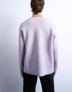 Model wearing Mixed up knitted cardigan in lilac