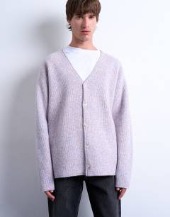 Model wearing Mixed up knitted cardigan in lilac