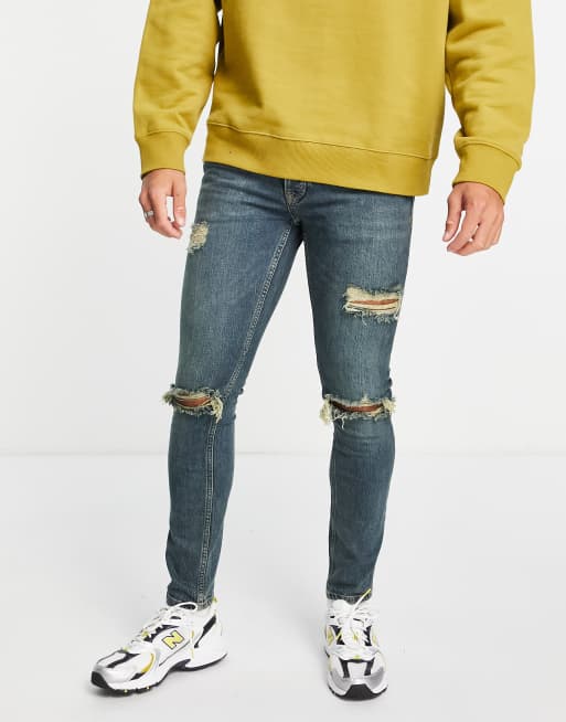 Topman – Niebieskie jeansy o obcisłym kroju ze stretchem, zielonym efektem sprania i rozdarciami