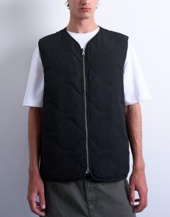 Model wearing Onion quilted gilet in black