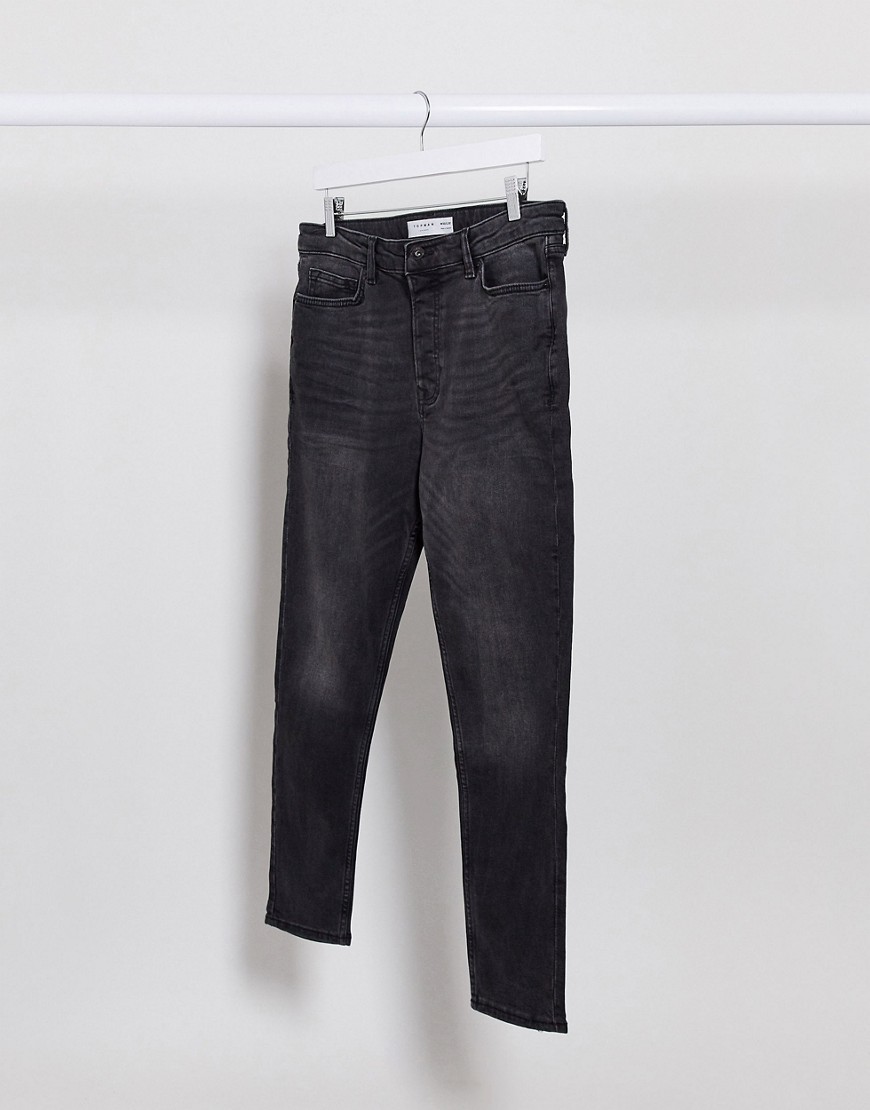 Topman organic cotton blend tapered jeans in washed black