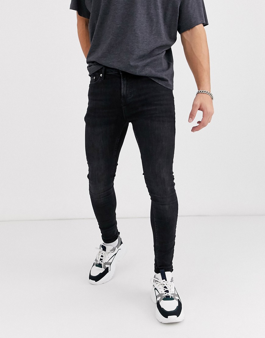 Topman organic cotton super spray on jeans in washed black