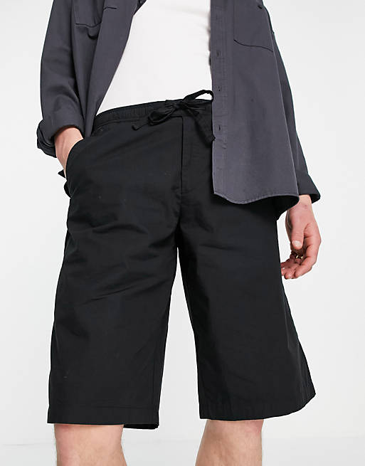 Topman organic cotton blend longline shorts in black