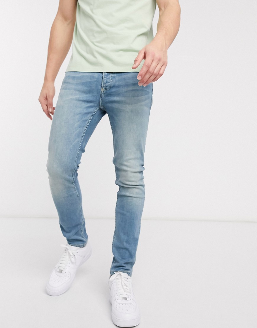 Topman organic skinny jeans in green cast blue