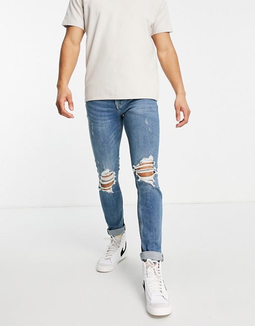 Topman organic cotton blend stretch skinny ripped jeans in mid wash
