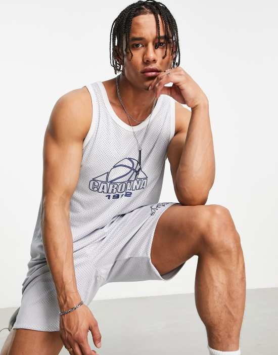https://images.asos-media.com/products/topman-oversized-basketball-tank-top-with-carolina-print-in-gray-part-of-a-set/201942308-1-grey?$n_550w$&wid=550&fit=constrain
