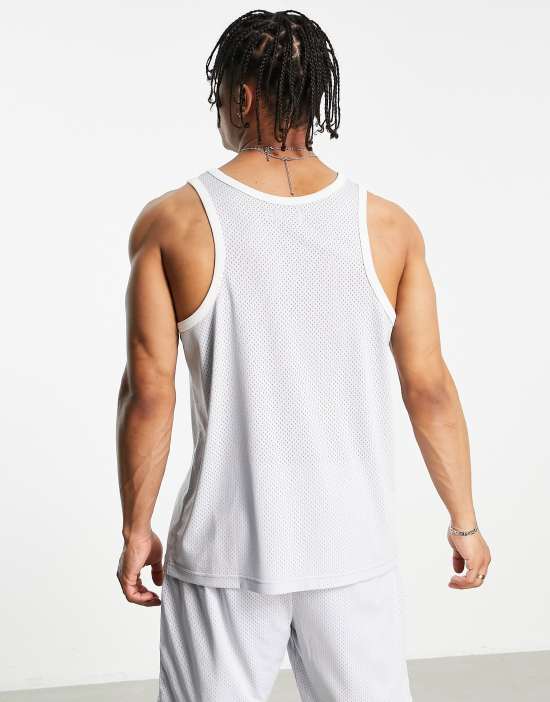 https://images.asos-media.com/products/topman-oversized-basketball-tank-top-with-carolina-print-in-gray-part-of-a-set/201942308-3?$n_550w$&wid=550&fit=constrain