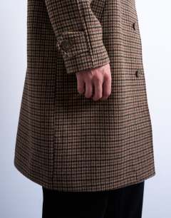Model wearing Oversized brushed check overcoat with wool in brown
