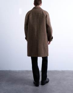 Model wearing Oversized brushed check wool overcoat in brown