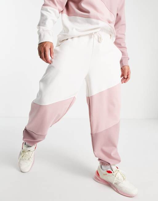 Pink colored sweatpants store