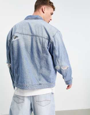 jean jacket with rips in the back