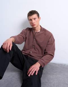 Model wearing Oversized fit bomber in washed brown