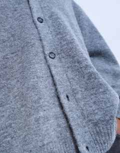 Model wearing Oversized fit button through cardigan in charcoal