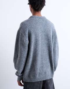 Model wearing Oversized fit button through cardigan in charcoal