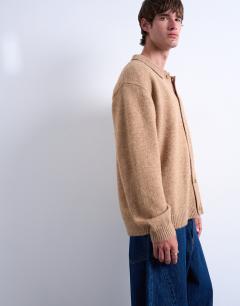 Model wearing Oversized fit button through cardigan in stone
