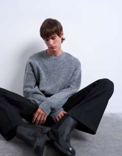 Model wearing Oversized fit crew jumper in charcoal