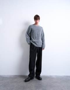 Model wearing Oversized fit crew jumper in charcoal