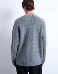 Model wearing Oversized fit crew jumper in charcoal