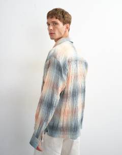 Model wearing Oversized fit crinkle check shirt in grey