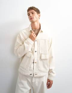 Model wearing Oversized fit denim jacket in natural