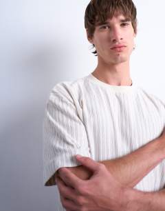 Model wearing Oversized fit fine stripe t-shirt in ecru
