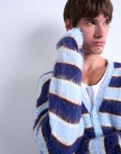Model wearing Oversized fit fluffy knitted stripe cardigan in blue