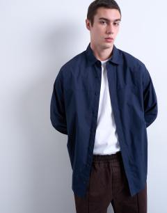 Model wearing Oversized fit formal shirt in navy