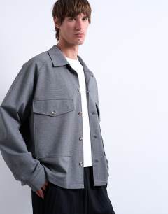 Model wearing Oversized fit interlock jersey jacket in grey