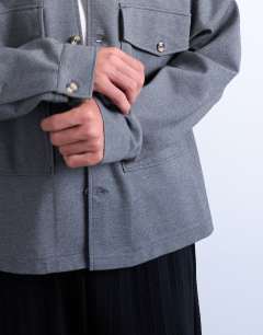 Model wearing Oversized fit interlock jersey jacket in grey