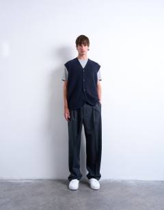 Model wearing Oversized fit knitted button through tank in navy