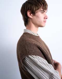 Model wearing Oversized fit knitted crew neck tank in brown