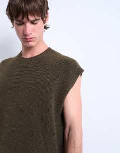 Model wearing Oversized fit knitted crew neck tank in khaki