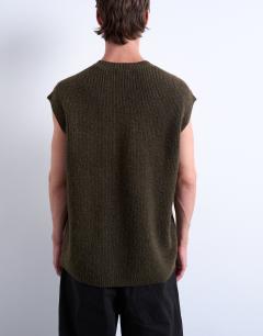 Model wearing Oversized fit knitted crew neck tank in khaki