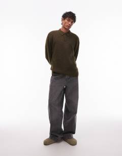 Model wearing Oversized fit knitted polo in khaki