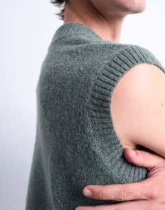 Model wearing Oversized fit knitted v-neck tank in sage green