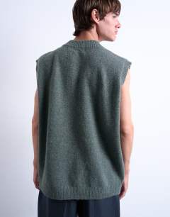 Model wearing Oversized fit knitted v-neck tank in sage green