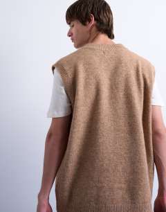 Model wearing Oversized fit knitted v-neck tank in stone