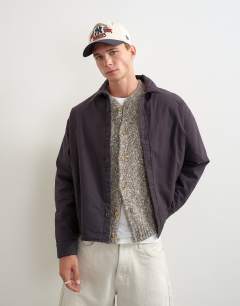 Model wearing Oversized fit padded overshirt in ink navy
