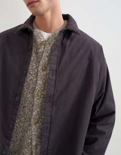 Model wearing Oversized fit padded overshirt in ink navy