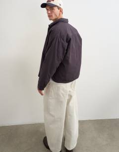 Model wearing Oversized fit padded overshirt in ink navy