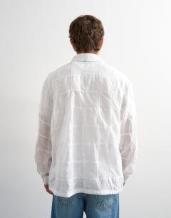 Model wearing Oversized fit patchwork shirt in white