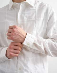 Model wearing Oversized fit patchwork shirt in white