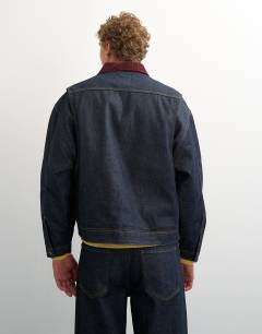 Model wearing Oversized fit quilted denim jacket with cord collar in raw