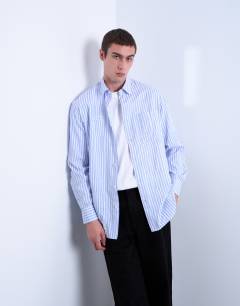 Oversized fit stripe shirt with all over distressing in blue