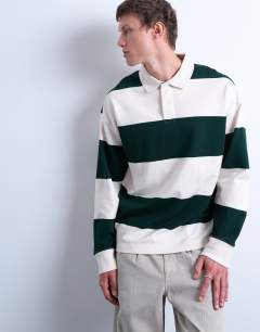 Model wearing Oversized fit striped rugby polo in dark green