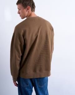 Model wearing Oversized fit sweatshirt with letter embroidery in brown