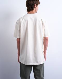 Model wearing Oversized fit t-shirt in ecru