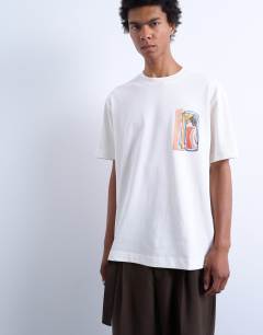 Model wearing Oversized fit t-shirt with abstract block print in ecru