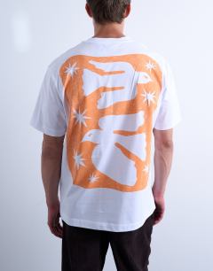 Model wearing Oversized fit t-shirt with front and back bird doodle print and embroidery in white